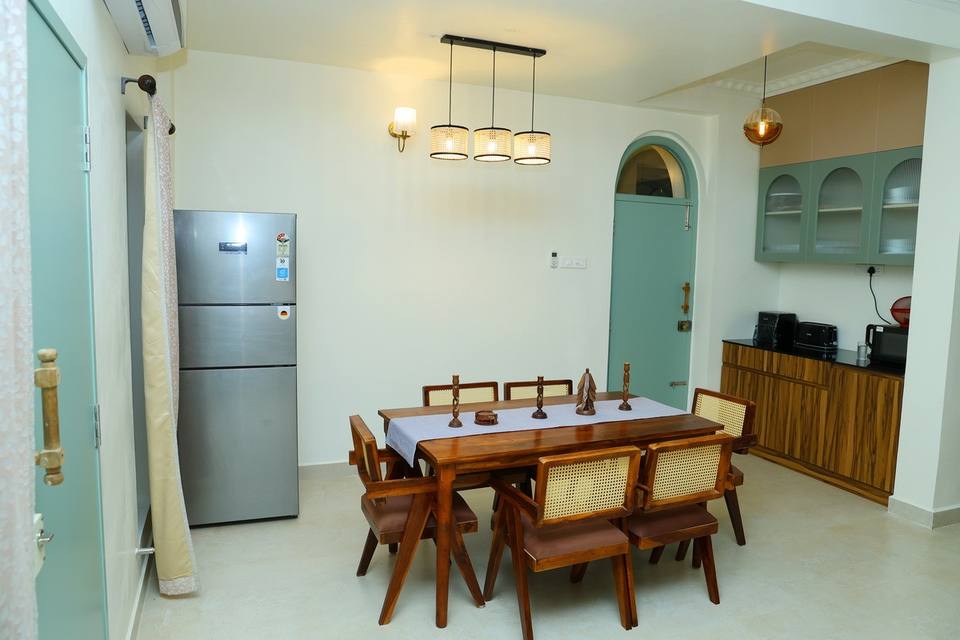 Dining area with fridge and pantry
