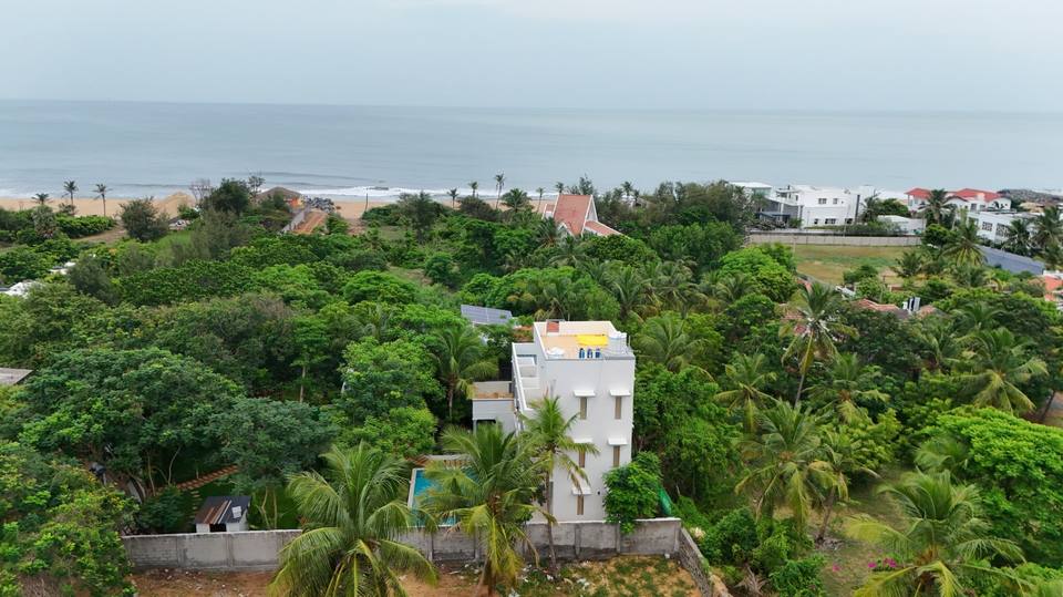 Bruno Villa from above, with the beach and the sea just beyond