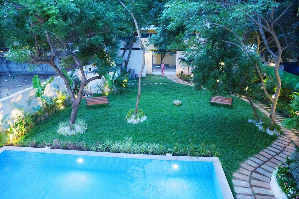 The pool and lawn at dusk